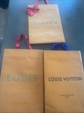 3 Louis Vuitton Orange Gift Bags with Red 
 and Blue Ribbon Handles